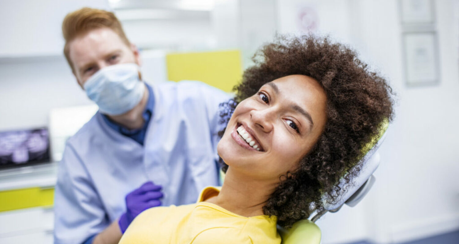 Woman smiling during dental checkup